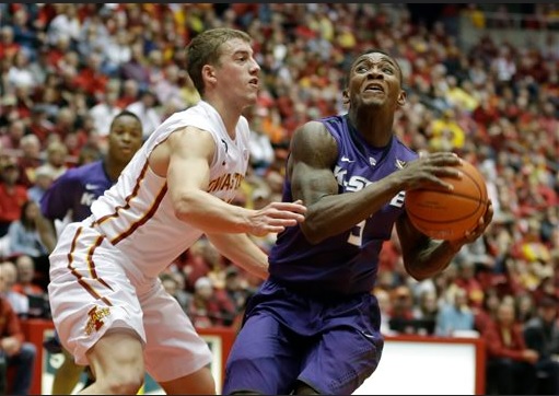 Kansas State guard Jevon Thomas, right, drives on Iowa State's Matt Thomas during the first half on Jan. 25, 2014, Ames, Iowa. (AP Photo/Charlie Neibergall)