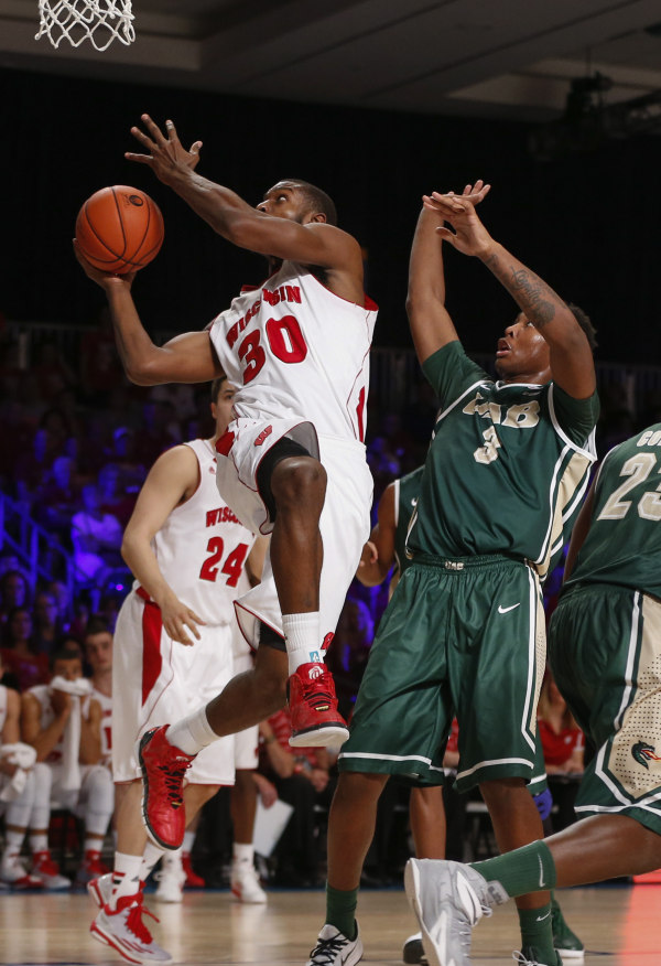 Badgers forward Vitto Brown (30) shoots as UAB's Chris Cokley (3) and Wisconsin's Bronson Koenig (24) look on. PHOTO: Kevin Jairaj-USA TODAY