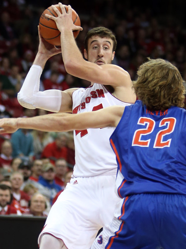 Wisconsin forward Frank Kaminsky (top) looks to pass as Boise State Broncos guard Robert Heyer (22) defends. PHOTO: Mary Langenfeld-USA TODAY