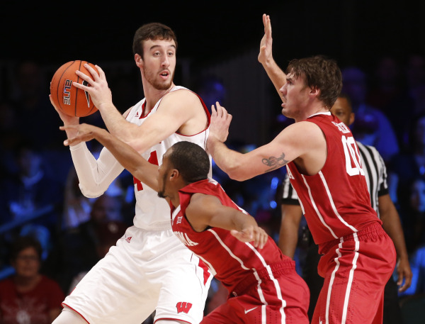 Wisconsin forward Frank Kaminsky (44) is doubled by Oklahoma forward Ryan Spangler (00) and guard Jordan Woodard (bottom). PHOTO: Kevin Jairaj, USA TODAY