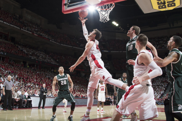 Frank Kaminsky (44) tosses the ball up for a basket during the Badgers' 68-61 win over Michigan State on Sunday, March 1 at the Kohl Center. PHOTO: David Stluka 