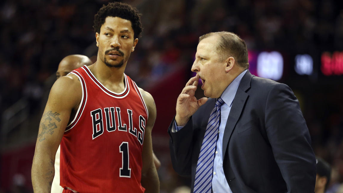 Bulls coach Tom Thibodeu speaks with guard Derrick Rose during the second half. PHOTO: Nuccio DiNuzzo, Chicago Tribune