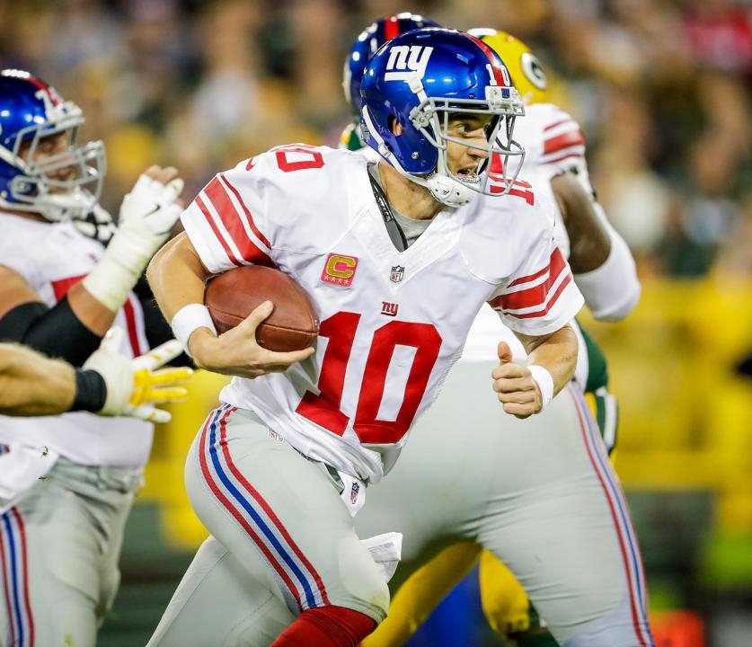 Eli Manning headed back to playoff home away from home, Lambeau Field