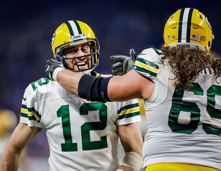 Rodgers caps brilliant run, Packers beat Lions for NFC North