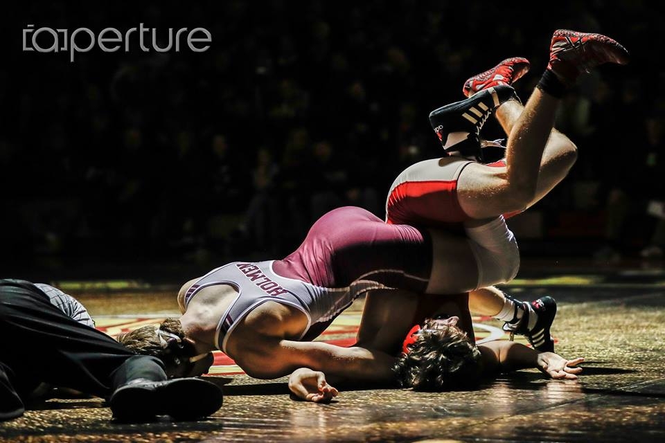 High schools allow use of two-piece wrestling uniforms