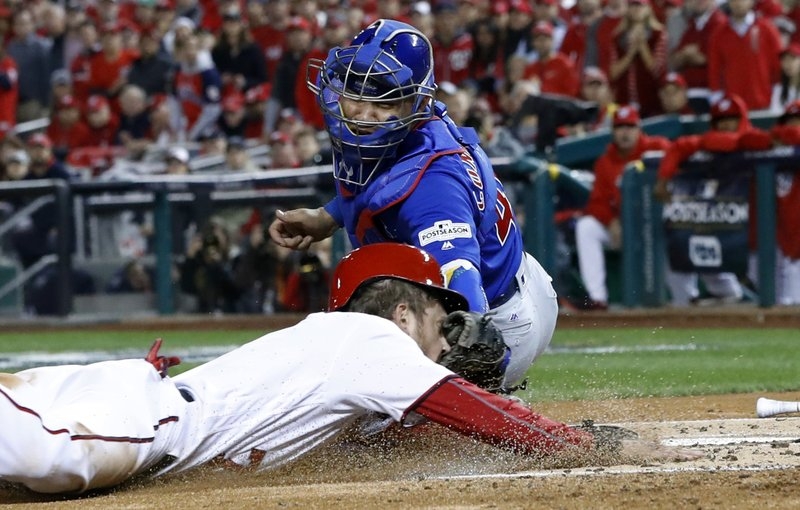 Cubs get to Scherzer, then hold on to top Nats 9-8 in Game 5