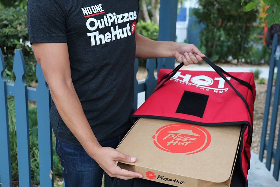 NFL sidelined pizza sales? Papa John’s says yes, others (Pizza Hut) say no