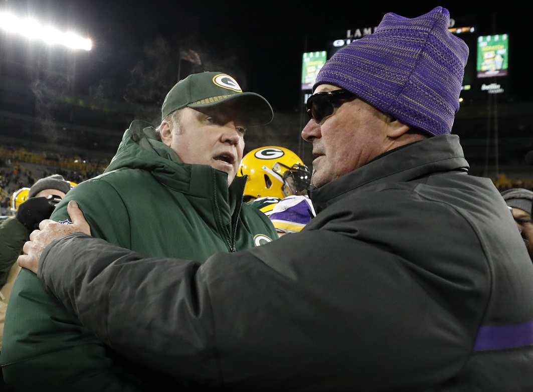 Aaron Rodgers and Jeff Saturday.  Green bay packers, Green bay