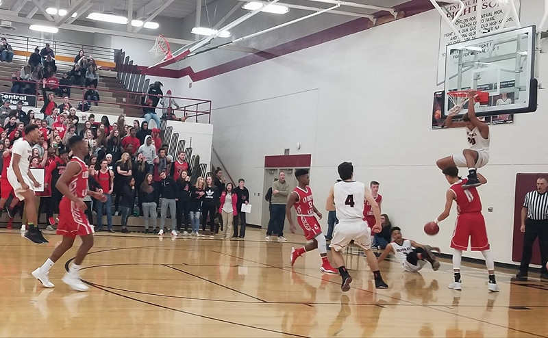 WATCH: Central’s Johnny Davis with the alley-oop slam from Deandre Davis