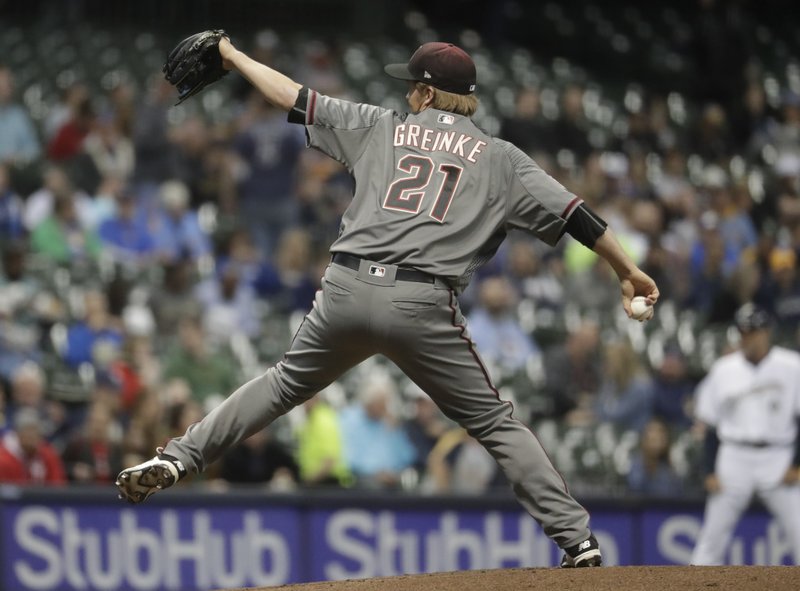 Brewers knock 3 HRs off Greinke