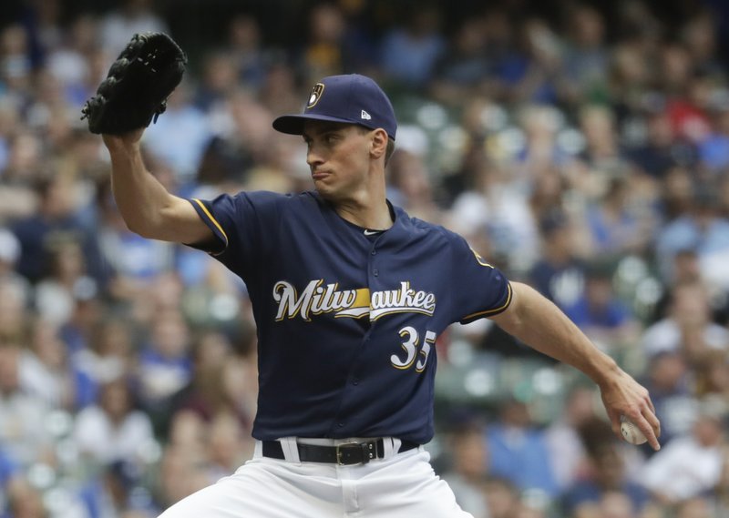 WATCH: First homer since high school, Brewers’ reliever takes Cy Young winner yard in win