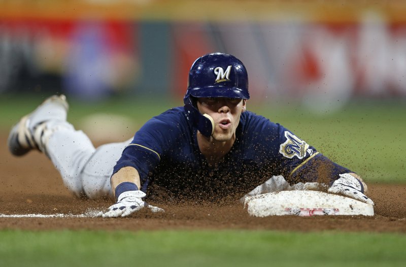 Brewers Christian Yelich slides AP