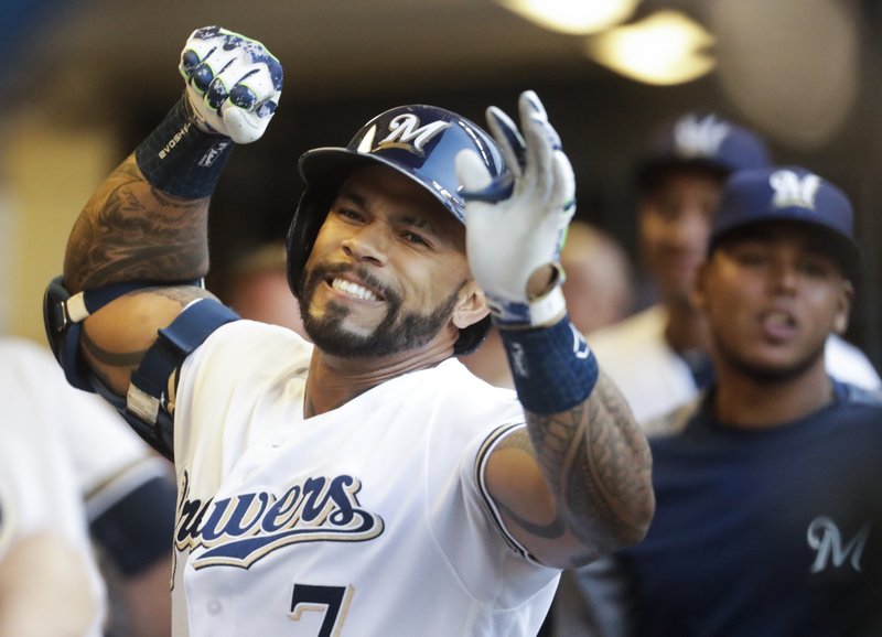 Three HRs in first lift Brewers past Padres