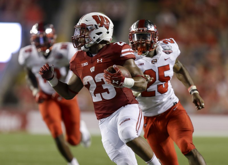 Running track sped up success for Badgers RB Jonathan Taylor