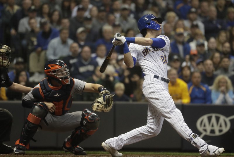 As Yelich inches toward triple crown, Brewers pull even with Cubs