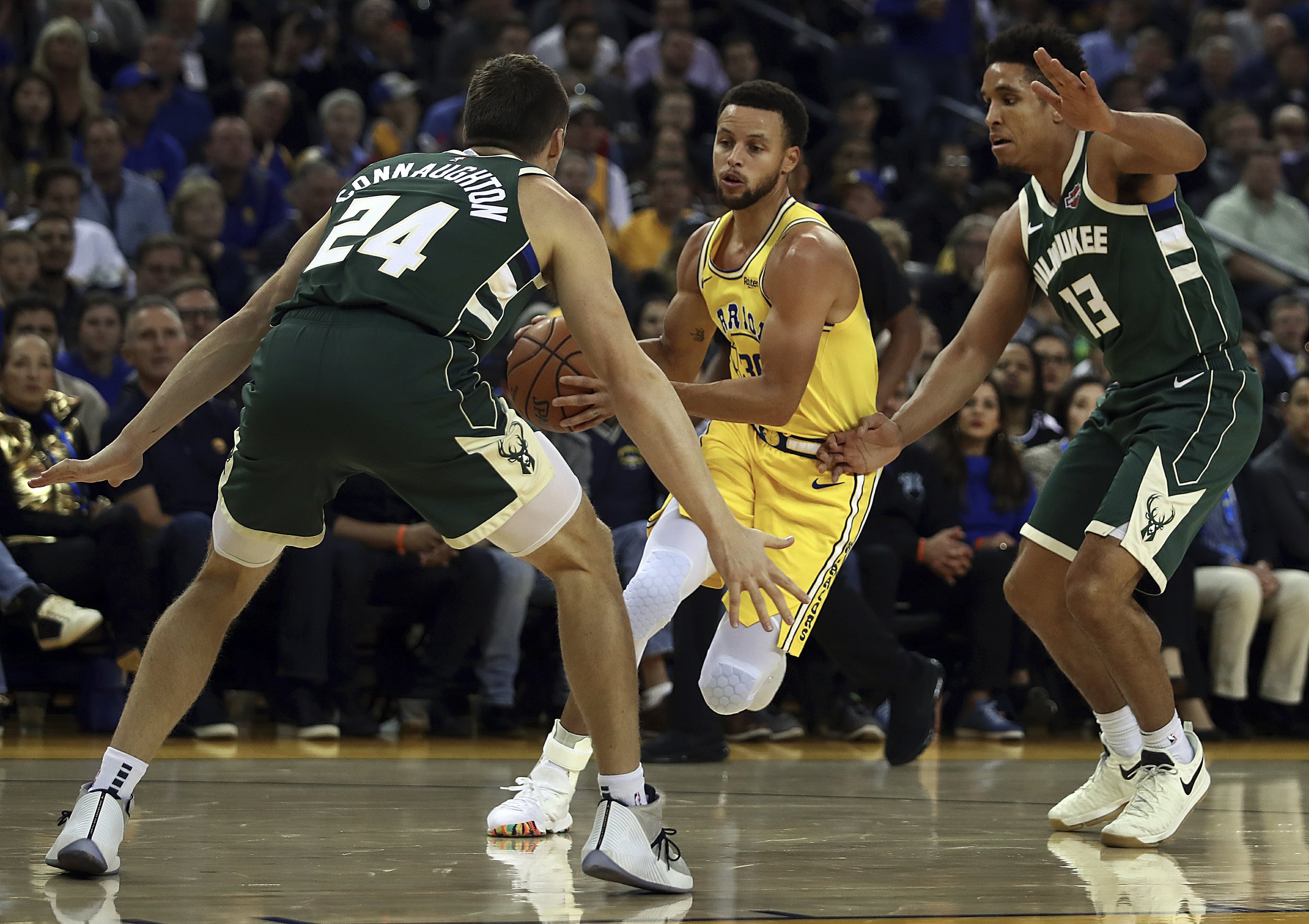 Curry injured, Bucks snap Warriors’ 8-game win streak