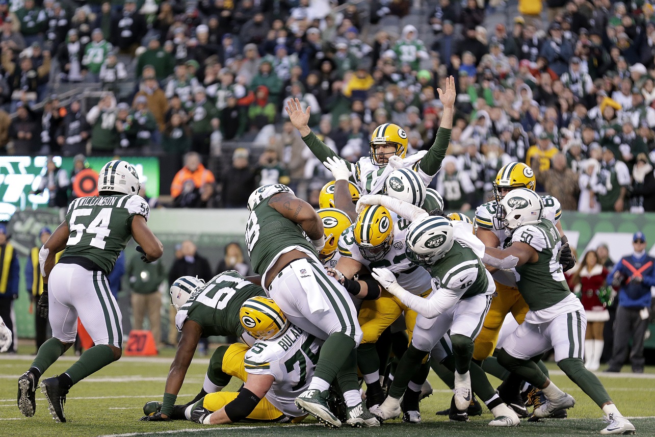 Rodgers leads Packers to wild overtime win over Jets