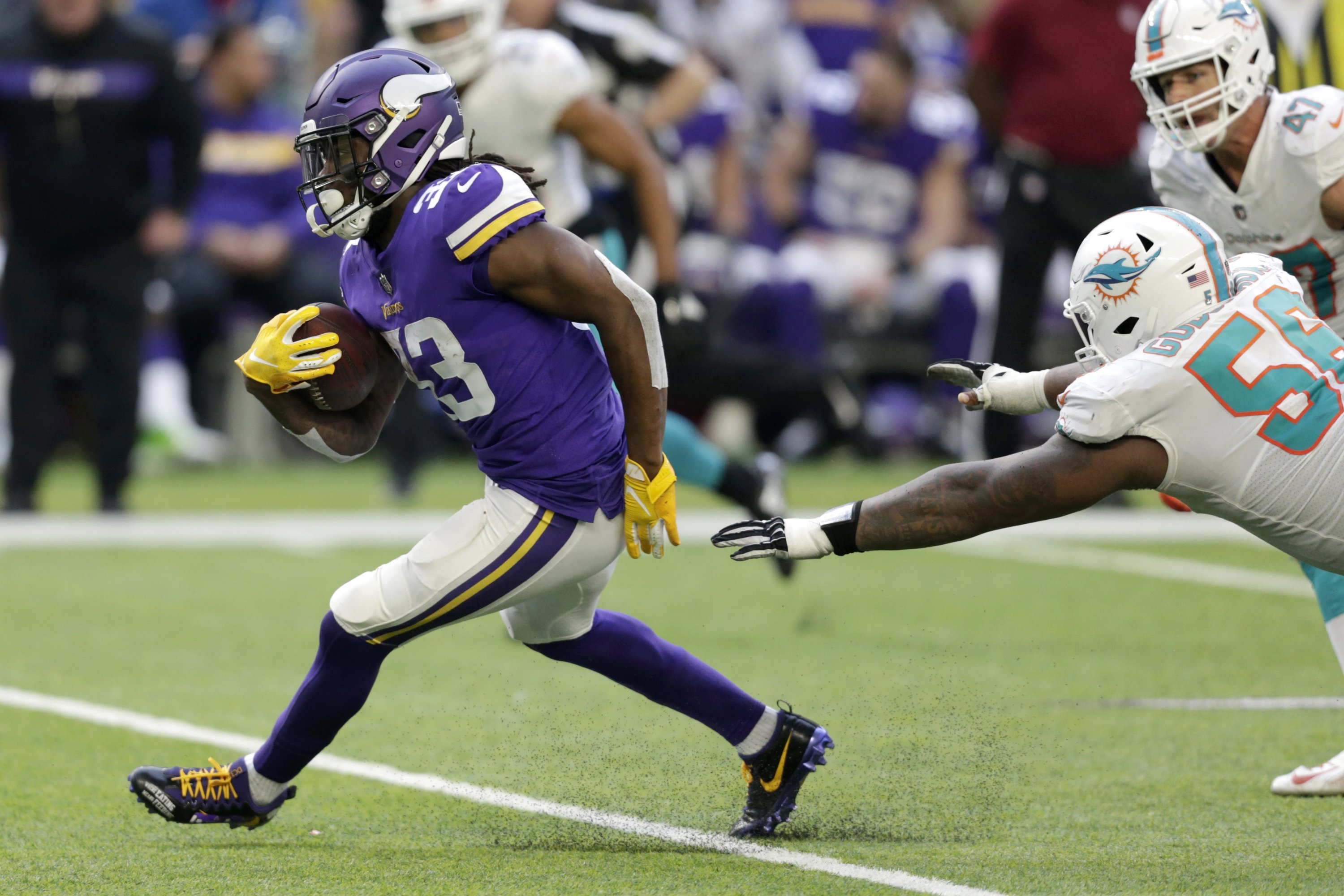 Cook is back, rushes for career high in Vikings win