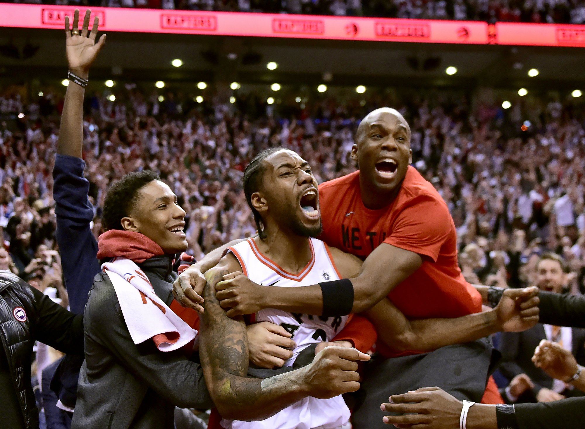 ON TO MILWAUKEE: Leonard hits bouncer at buzzer, Raptors beat 76ers in Game 7