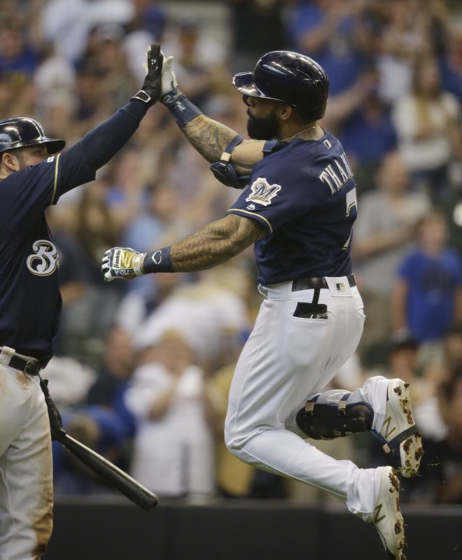 Brewers slip past Pirates 2-1 on Thames’ homer in 8th