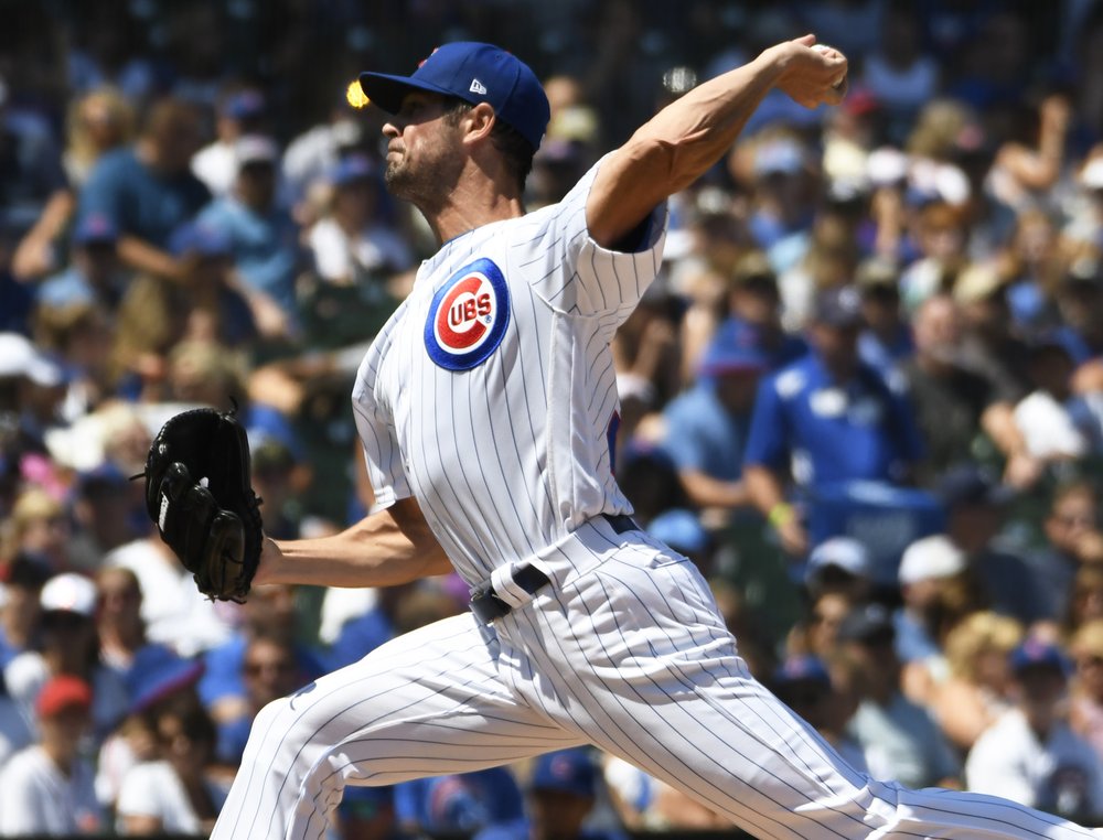 Hamels sharp in return, Almora and Cubs beat Brewers 4-1
