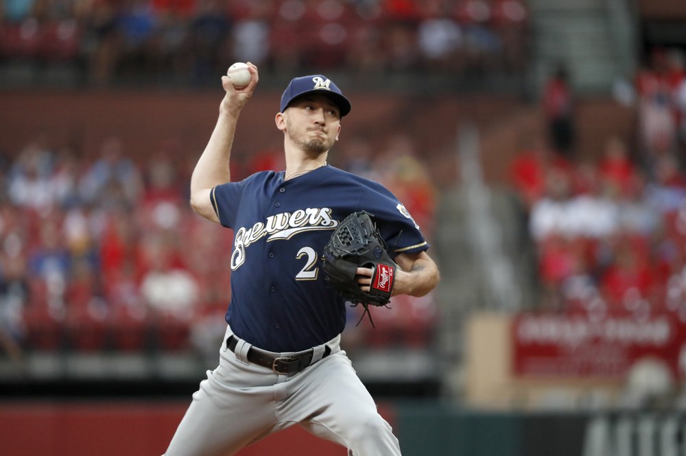 Hudson, Cards take no-hit bid into 8th and blank Brewers 3-0