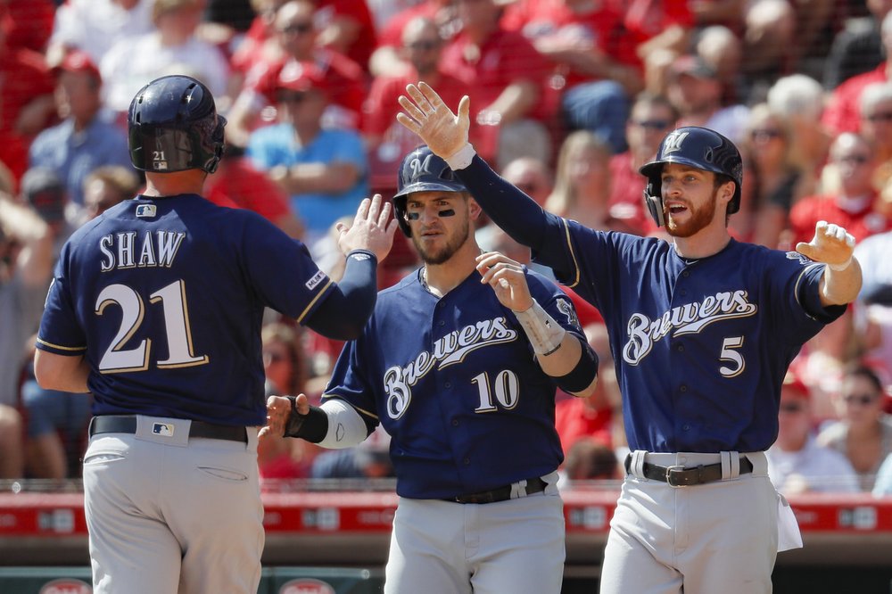 Playoff-bound Brewers sweep Reds 5-3, close in on Cardinals