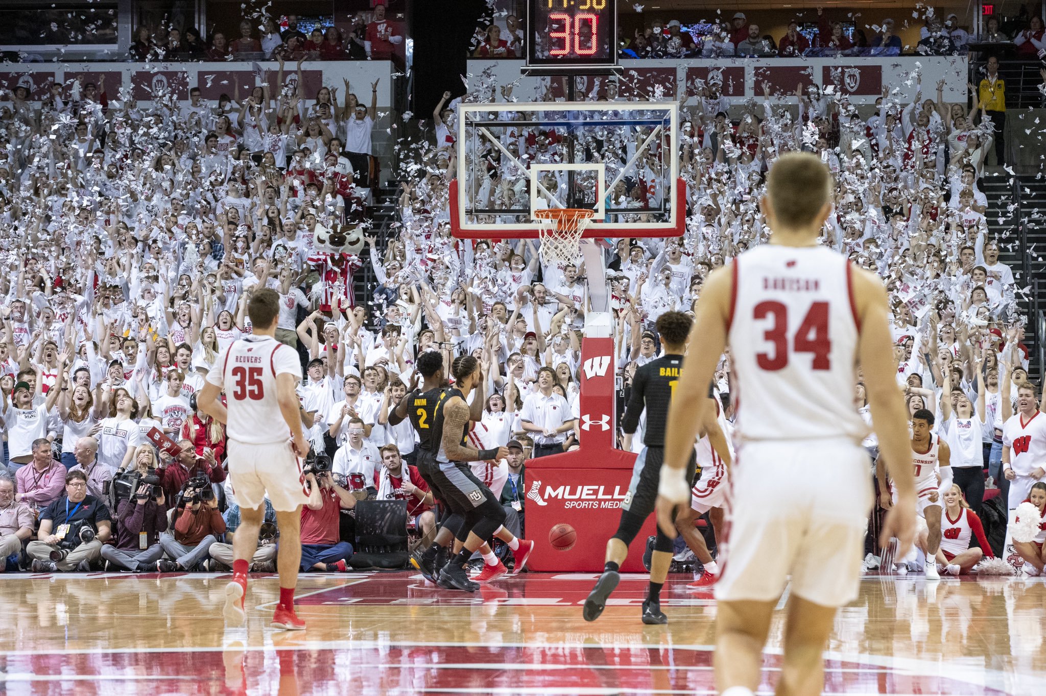 Badgers use balanced attack to defeat rival Marquette 77-61