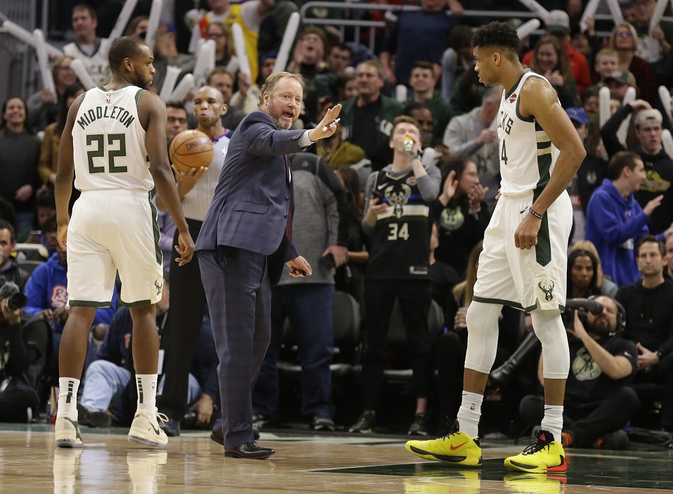 Antetokounmpo scores 32, Bucks hold off injury-plagued Wolves 106-104