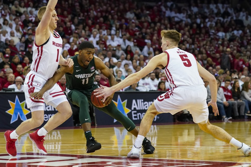 Wisconsin edges No. 14 Michigan State 64-63