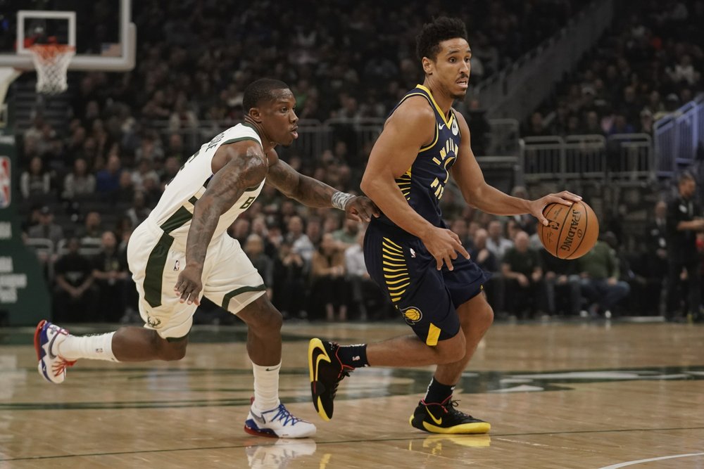 NBA-leading Bucks bounce back from loss to rout Pacers