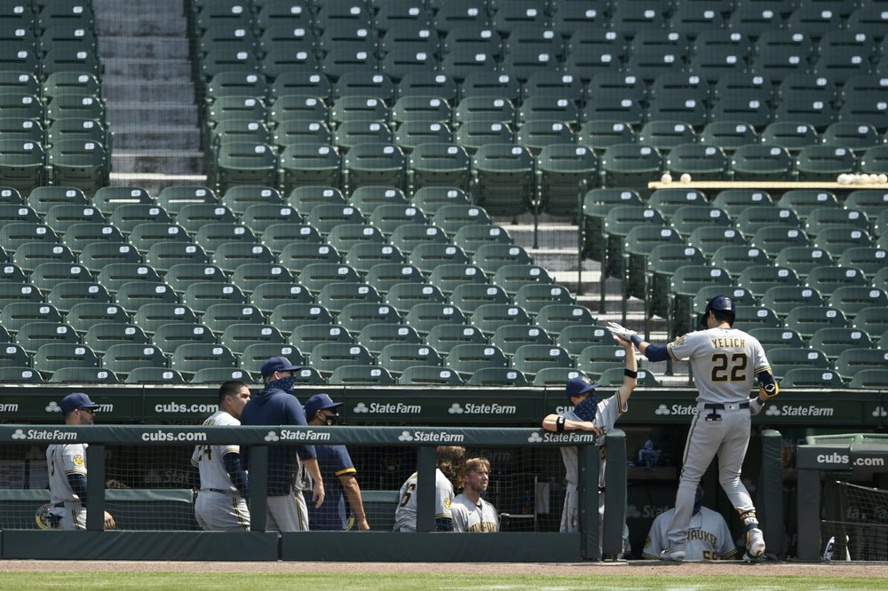 Yelich, Smoak homer, tempers flare as Brewers beat Cubs 8-3