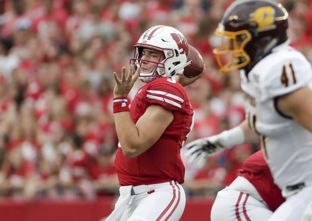 After Long Layoff, No. 13 Badgers Visit Reeling Wolverines