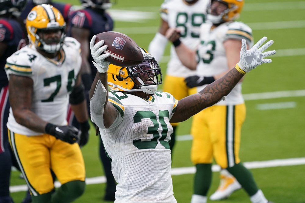 AP source: RB Jamaal Williams agrees to sign with Lions