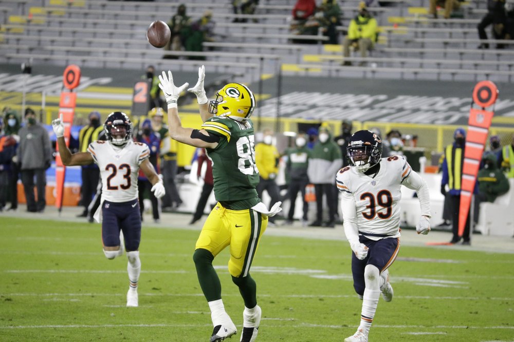 Rodgers’ 4 TD passes help Packers roll over Bears 41-25