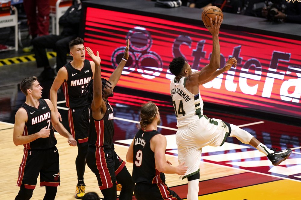 Bucks set NBA record for 3s with 29 in 144-97 romp over Heat; Clippers beat Wolves