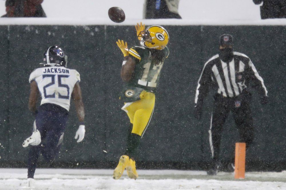 Adams Shines In Snow As Packers Trounce Titans, 40-14