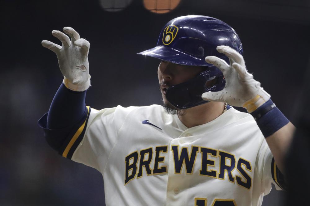 Brewers score 10 in 8th, beat Cubs 14-4 for 6th straight win