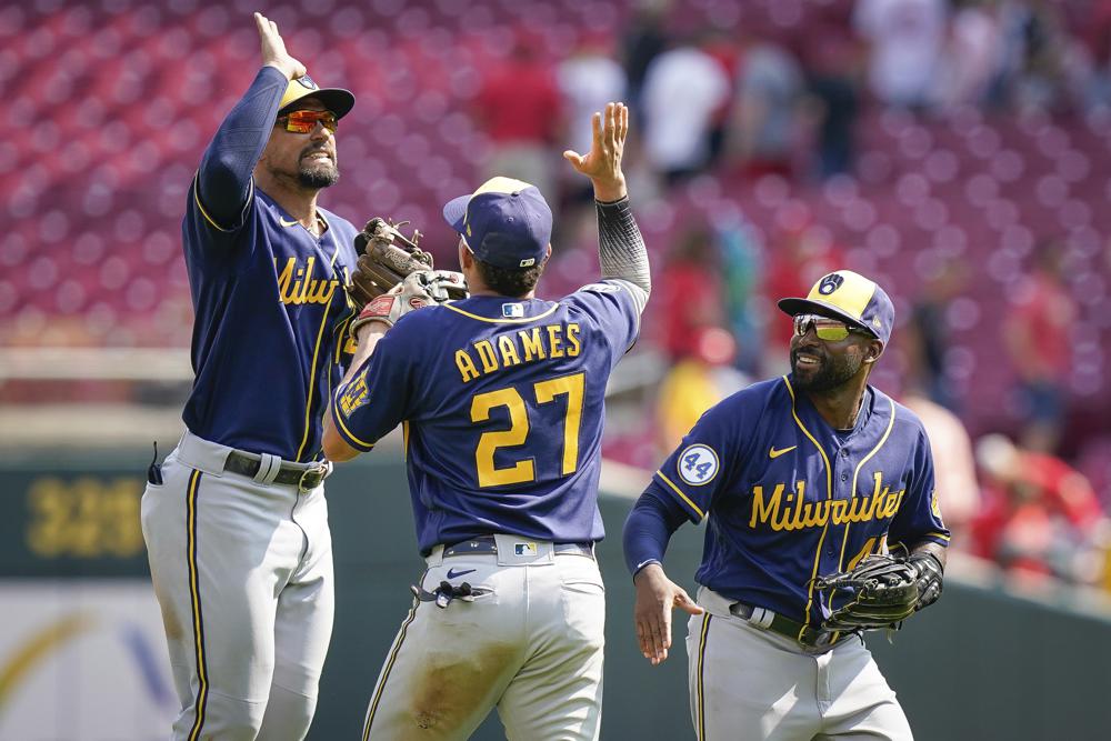 Road success helps Brewers take commanding NL Central lead