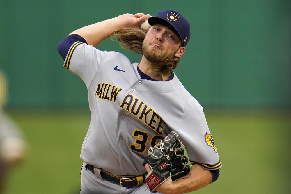 Burnes cruises, Brewers top Bucs for 9th straight win