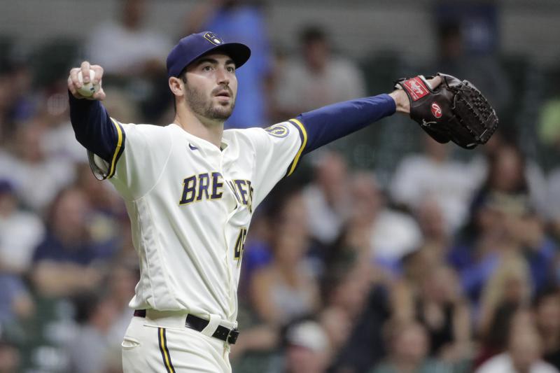 Newly acquired Brewers pitcher Curtiss out with torn elbow