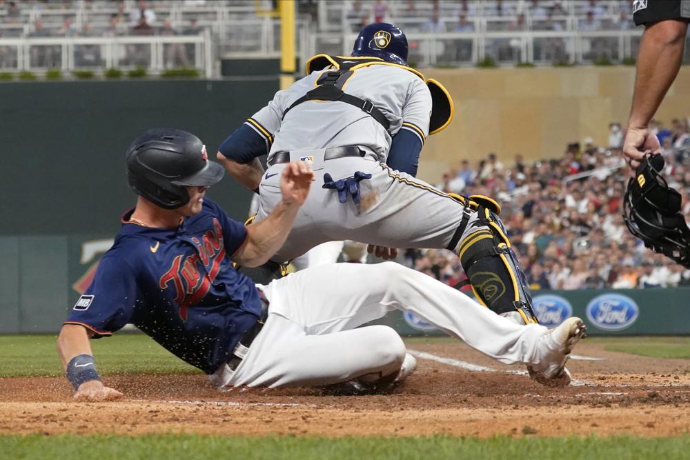 Twins outlast Brewers, rain in 6-4 win