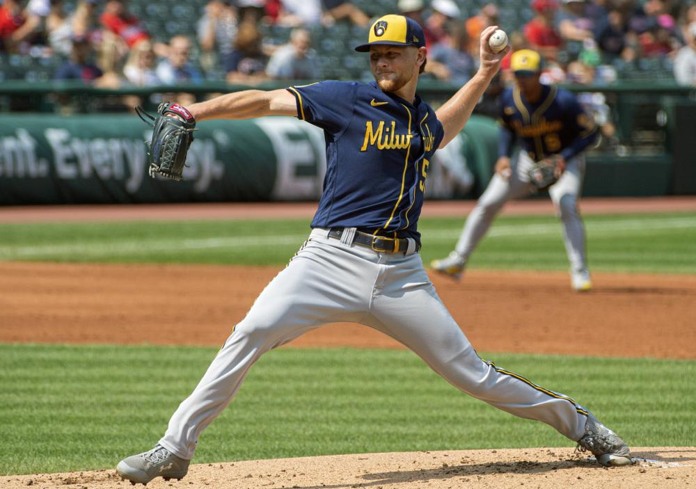 Day after team no-hitter, Lauer takes no-no into 6th; Brewers hit 5 HRs in 11-1 rout