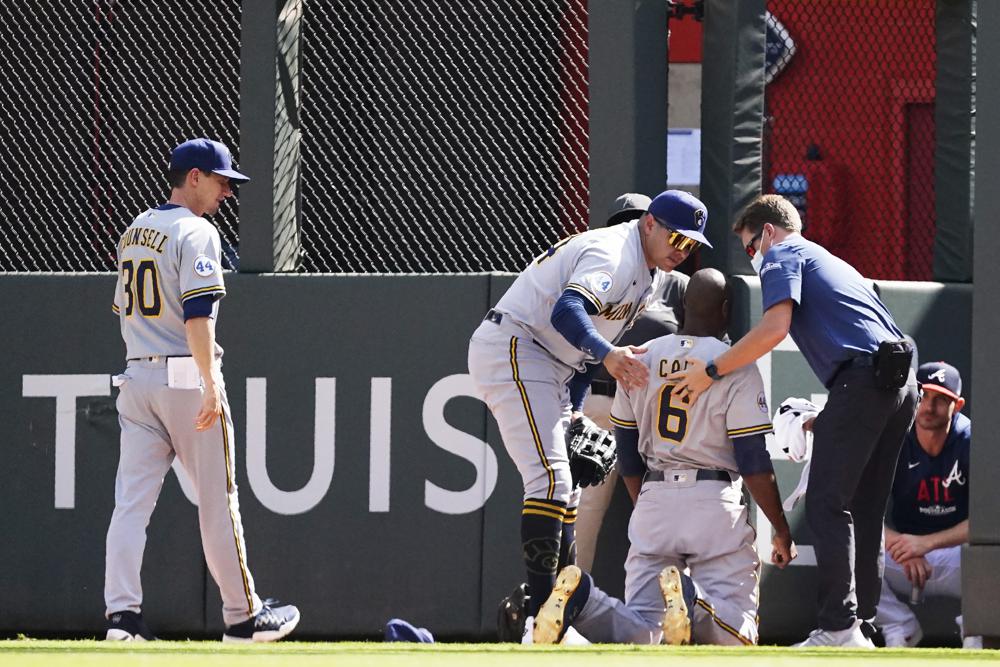 LEADING OFF: Braves make their pitch to close out Brewers