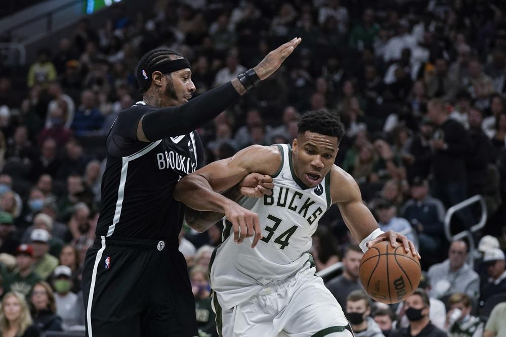Giannis unstoppable in Bucks win over Nets; Curry’s triple-double leads Warriors past Lakers