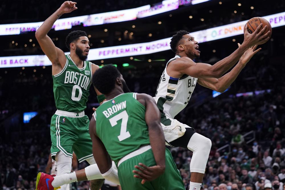 Bucks’ Middleton hurts knee, as Celtics get 42 from Tatum in win over Bucks