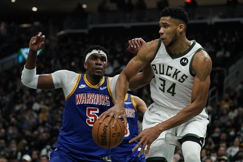 Antetokounmpo gets triple-double, as Bucks throttle Warriors without Holiday