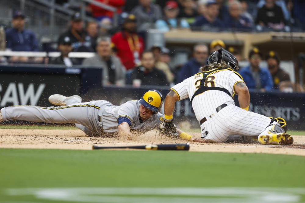 Padres win it in 10, after Brewers loaded bases with no outs, in top of inning