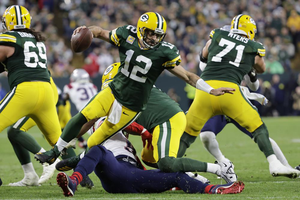 Rodgers remains upbeat amid thumb injury, Packers’ slump