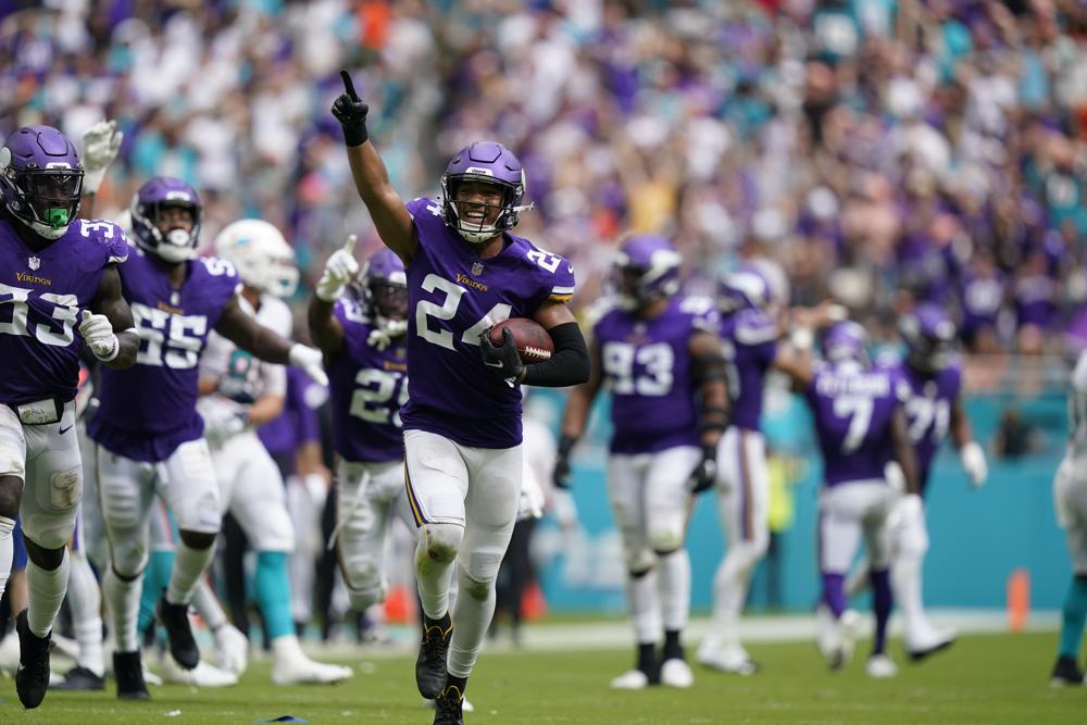 Cook’s late touchdown ices Vikings’ win over Dolphins
